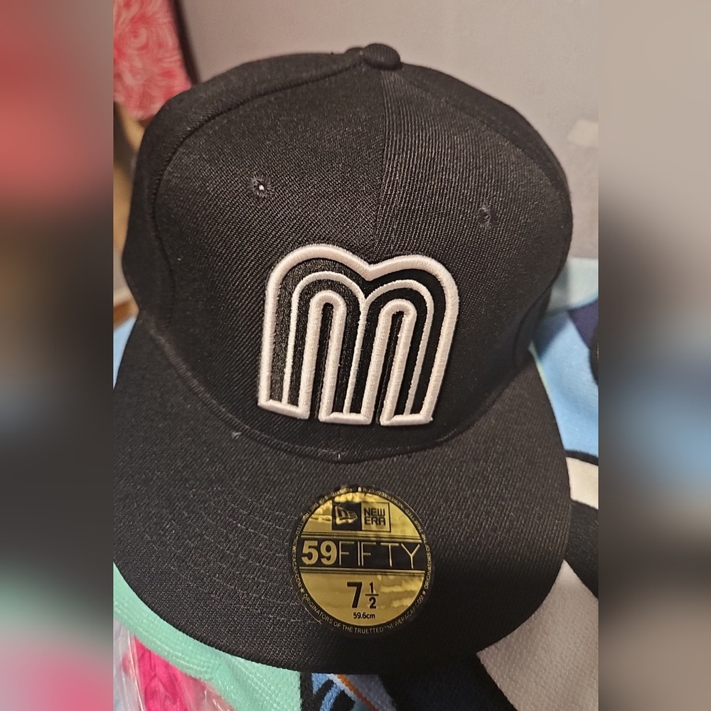 M cap